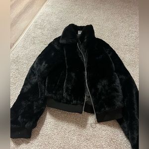 Faux fur zipper jacket new without tags. Never used